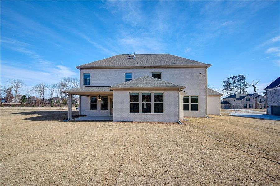 Exterior details and patio area of a home in Cambria at Traditions, Hampton (Image 4).