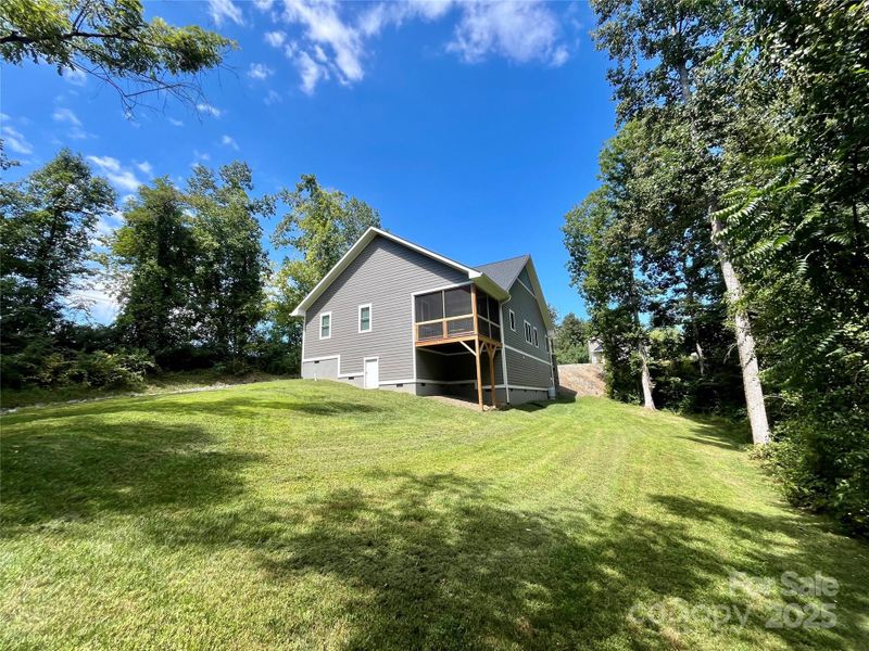Exterior details and patio area of a home in , Hendersonville (Image 24).