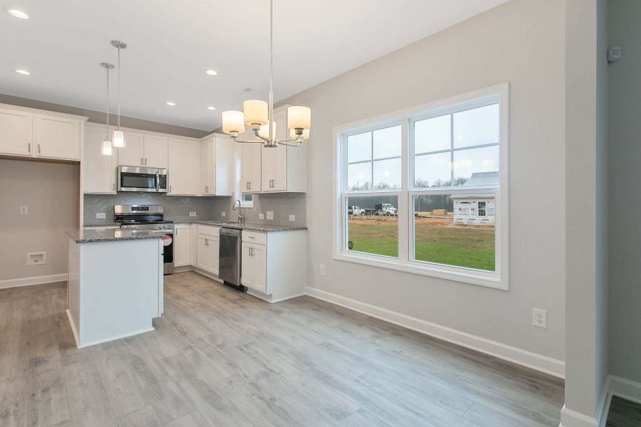 Representative furnished interior of a home built from the Magnolia by Caviness & Cates Communities in Bartlett Manor, Youngsville (Image 170).