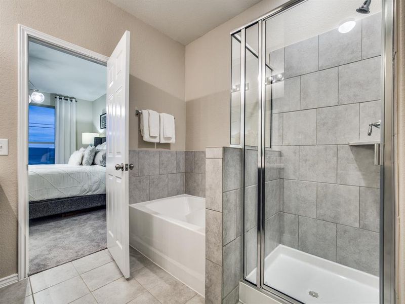 Elegant owner's bathroom with oversized shower
 *Photos of furnished model. Not actual home. Representative of floor plan. Some options and features may vary