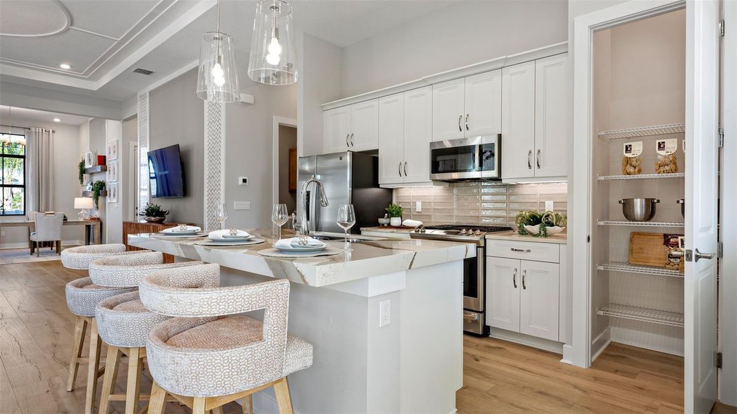 Furnished interior view inside a new home in Cresswind Palm Beach at Westlake, Westlake (Image 23).