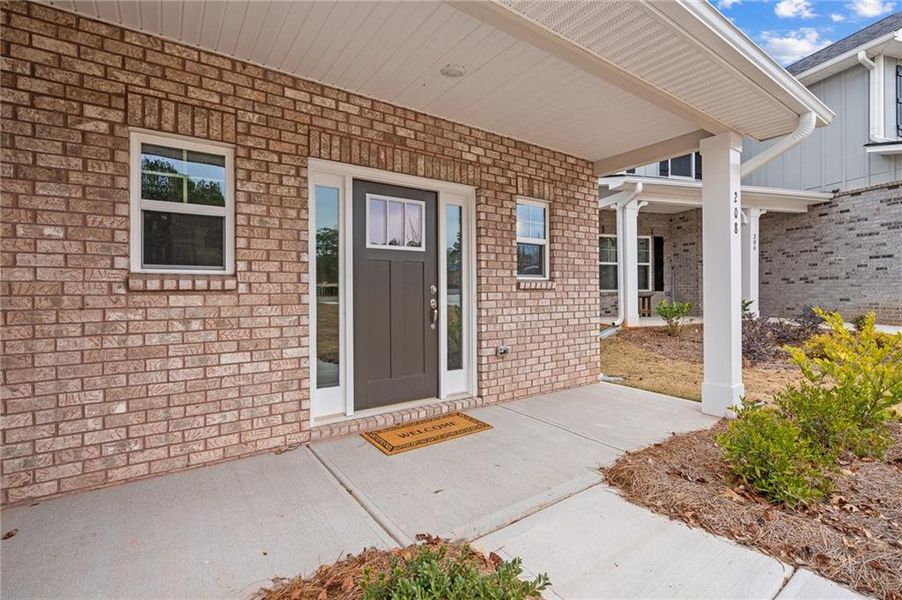 Exterior details and patio area of a home in Canterbury Villas, Carrollton (Image 21).