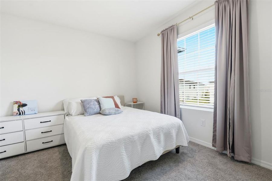 Furnished interior view inside a new home in , Kissimmee (Image 15).
