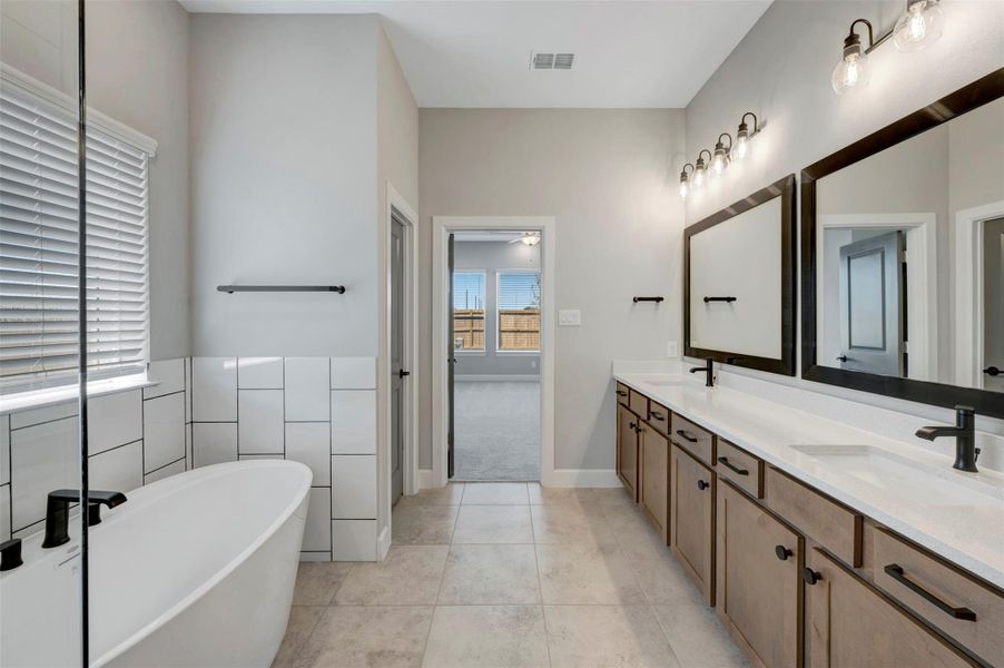 Furnished interior view inside a new home in Meridiana 55' Homesites, Manvel (Image 13).