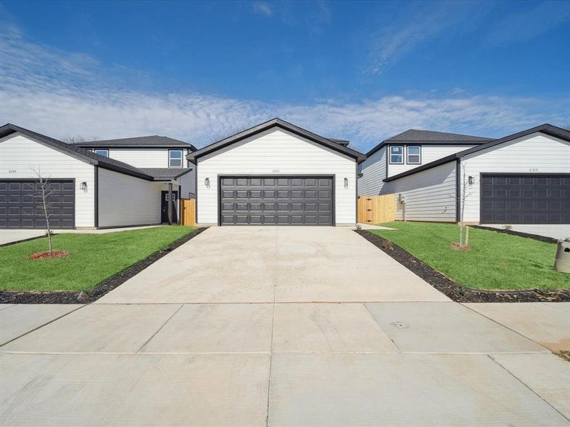 View of front of house with a front yard