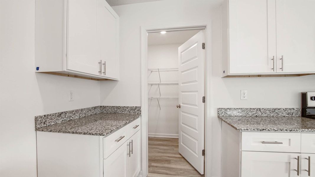 Representative furnished interior of a home built from the Robie by D.R. Horton in Riverwalk, Freeport (Image 8).