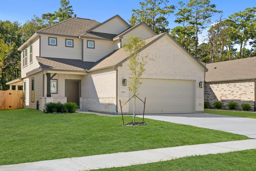 Front exterior of a new home in Cypresswood Landing, Humble, TX, highlighting curb appeal (Image 13).