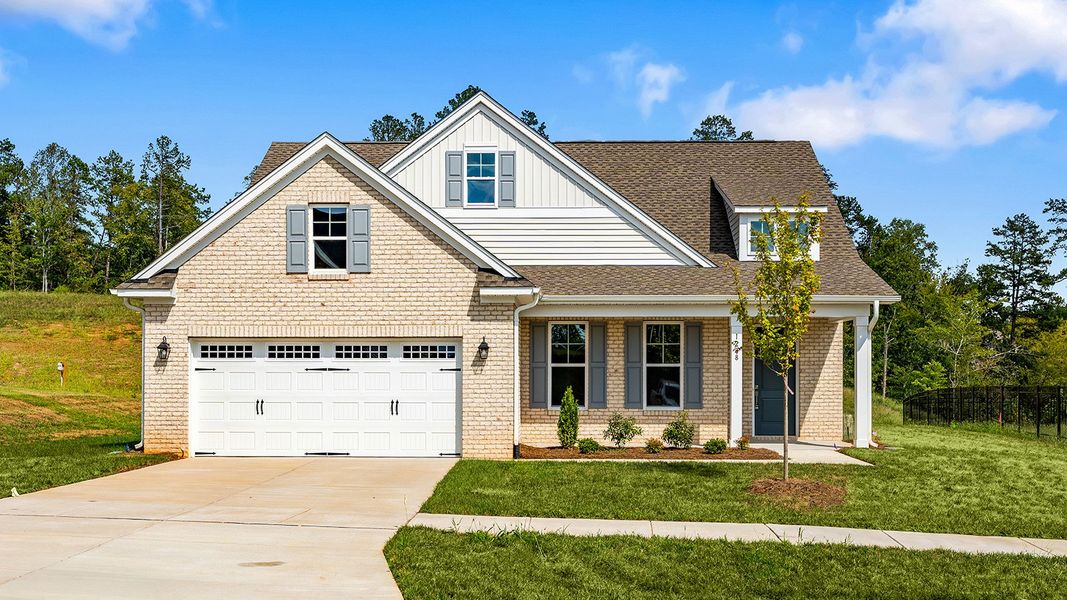 Front exterior of a new home in Brooke Hill, Lewisville, NC, highlighting curb appeal (Image 1). Front exterior of a new home in Brooke Hill, Lewisville, NC, highlighting curb appeal (Image 1).