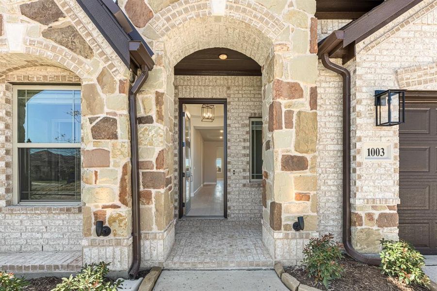 Front exterior of a new home in Timberbrook 3B-4A, Justin, TX, highlighting curb appeal (Image 2). Front exterior of a new home in Timberbrook 3B-4A, Justin, TX, highlighting curb appeal (Image 2).