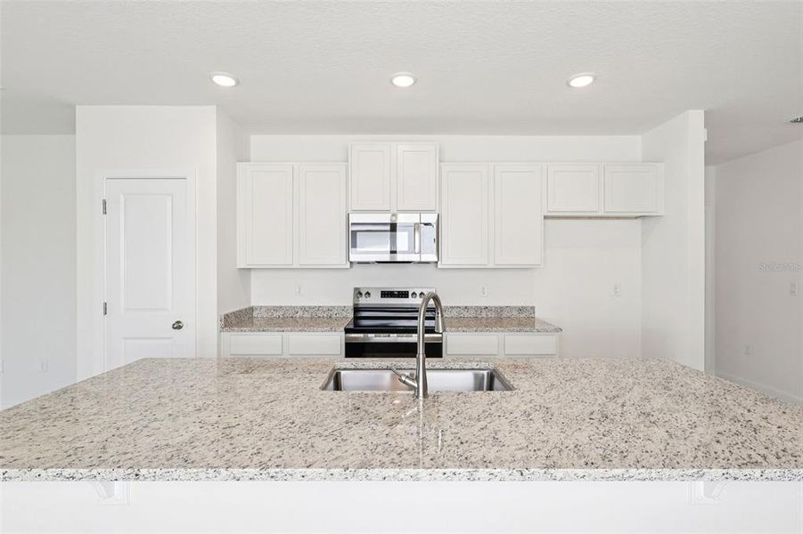 Furnished interior view inside a new home in Hamilton Bluff, Haines City (Image 7).