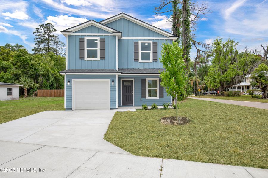 Front exterior of a new home in , Green Cove Springs, FL, highlighting curb appeal (Image 1). Front exterior of a new home in , Green Cove Springs, FL, highlighting curb appeal (Image 1).