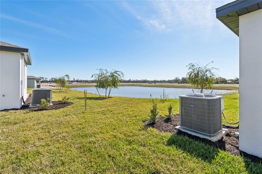 Exterior details and patio area of a home in Southpointe, Palmetto (Image 19).