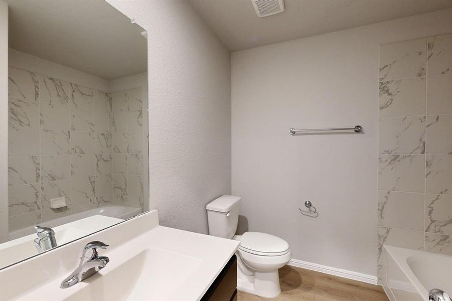 Furnished interior view inside a new home in Kings Way, Denton (Image 12).