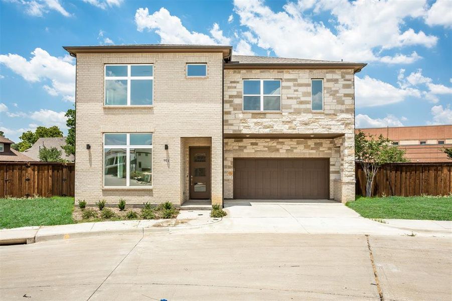 View of front of home featuring a garage