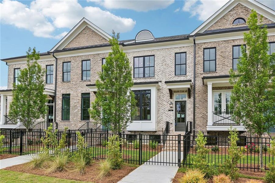 Front exterior of a new home in Byers Park, Alpharetta, GA, highlighting curb appeal (Image 21).