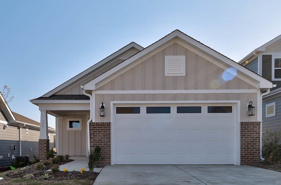 Representative exterior photo of a completed home built from the Elm by McKee Homes in Coastal Haven, Leland, NC (Image 2).