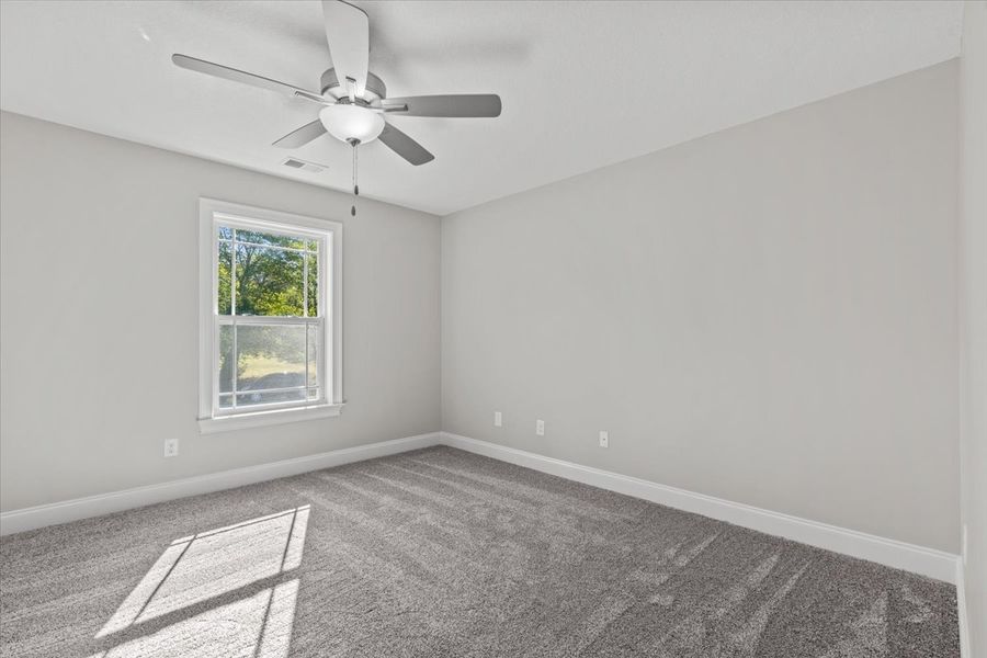 Representative unfurnished interior of a home built from the Enory by Enchanted Homes in Guadalupe Heights, Seguin (Image 37).