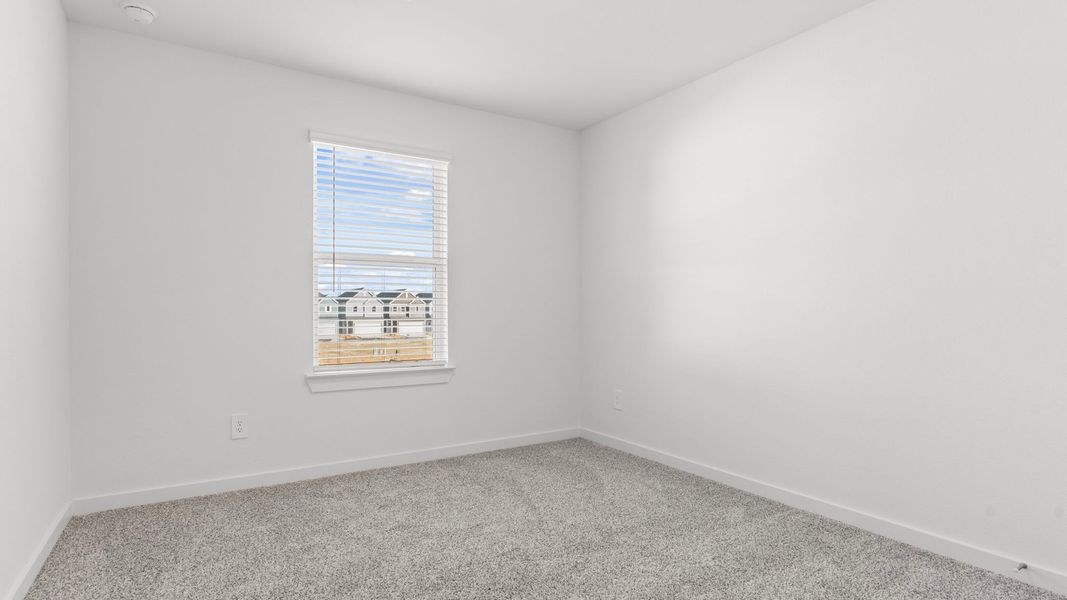 Spacious, unfurnished interior of a new home in Villarosa at Tamarron, Katy (Image 47).