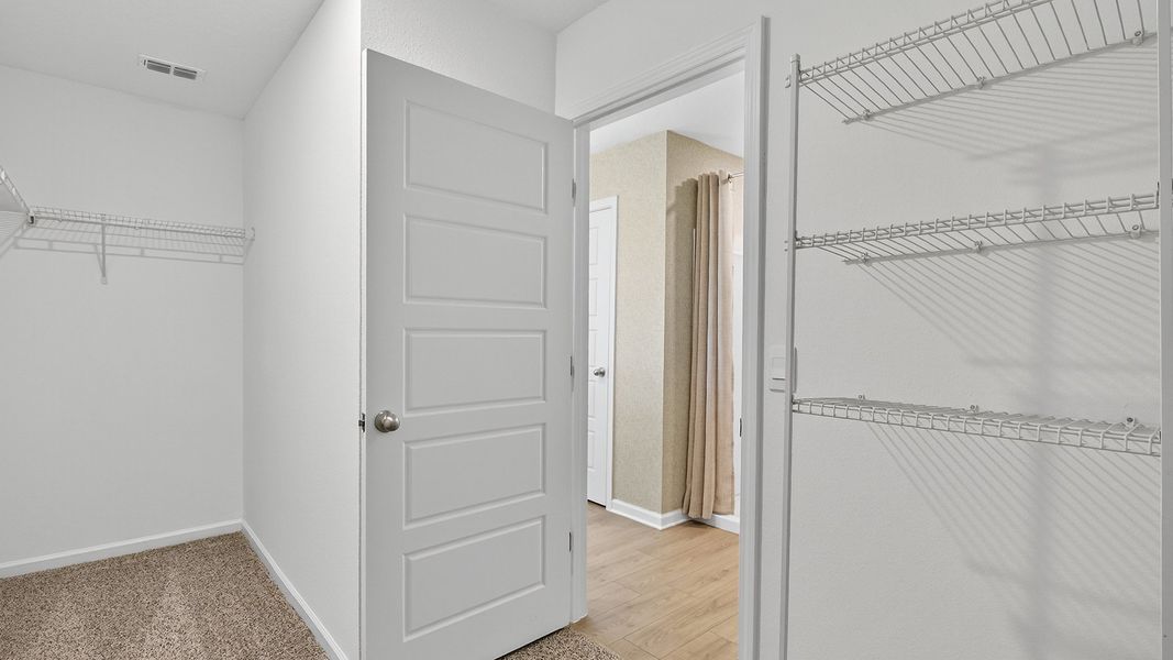 Representative unfurnished interior of a home built from the LAKESIDE by D.R. Horton in Copes Landing, Jacksonville (Image 21).