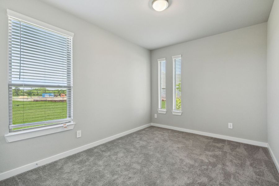 Bedroom in the Henley home plan by Trophy Signature Homes – REPRESENTATIVE PHOTO Bedroom in the Henley home plan by Trophy Signature Homes – REPRESENTATIVE PHOTO