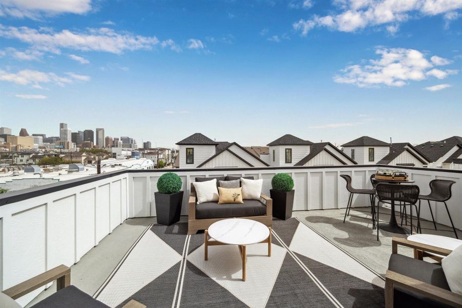 Best view in the area! Wait until you see this view at night! This is the South Plan...the homes across the street have the same view from the rooftop balcony with 300 more square ft on the inside and private driveways. Check out 2209 Dennis for listing specs!