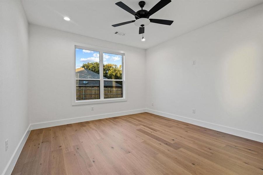 Unfurnished room featuring light wood-type flooring, recessed lighting, and ceiling fan