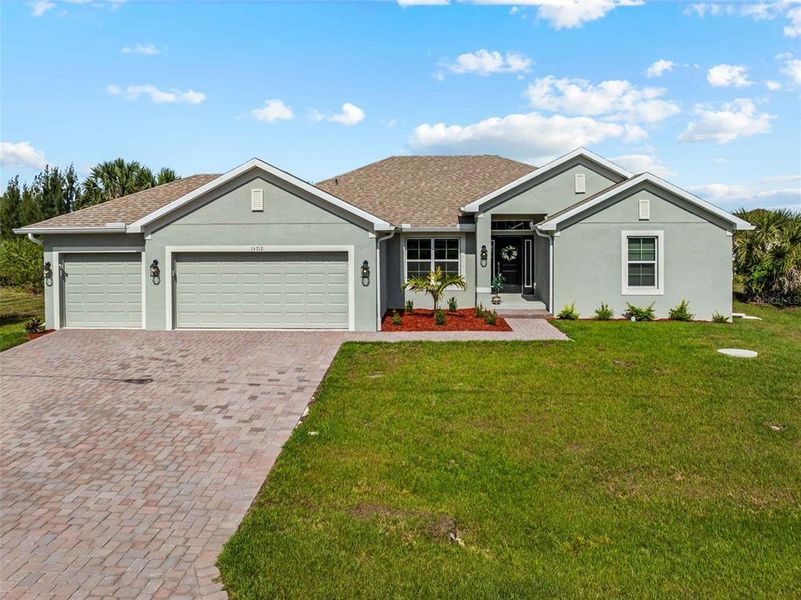 Front exterior of a new home in Port Charlotte, Port Charlotte, FL, highlighting curb appeal (Image 29).