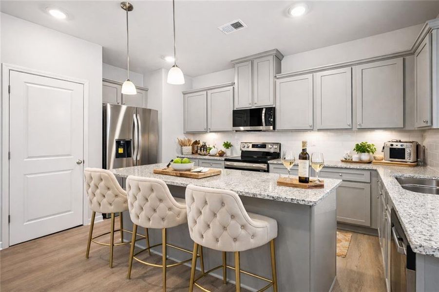 Furnished interior in a model home at The Hills at Cedar Creek in Winder (Image 39).