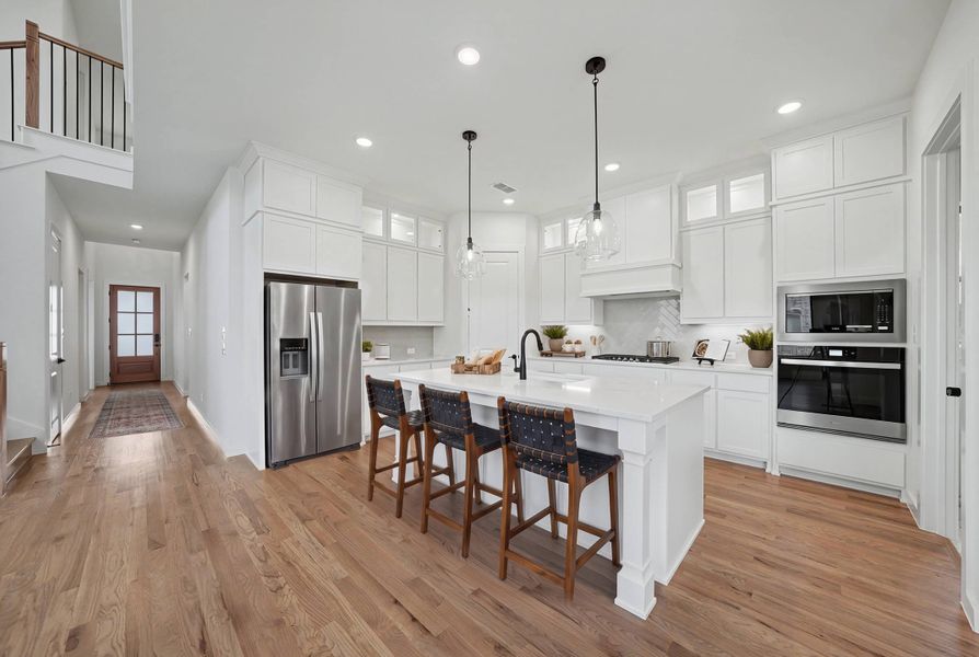 Furnished interior view inside a new home in Light Farms Brenham - 40' Lots, Celina (Image 13).