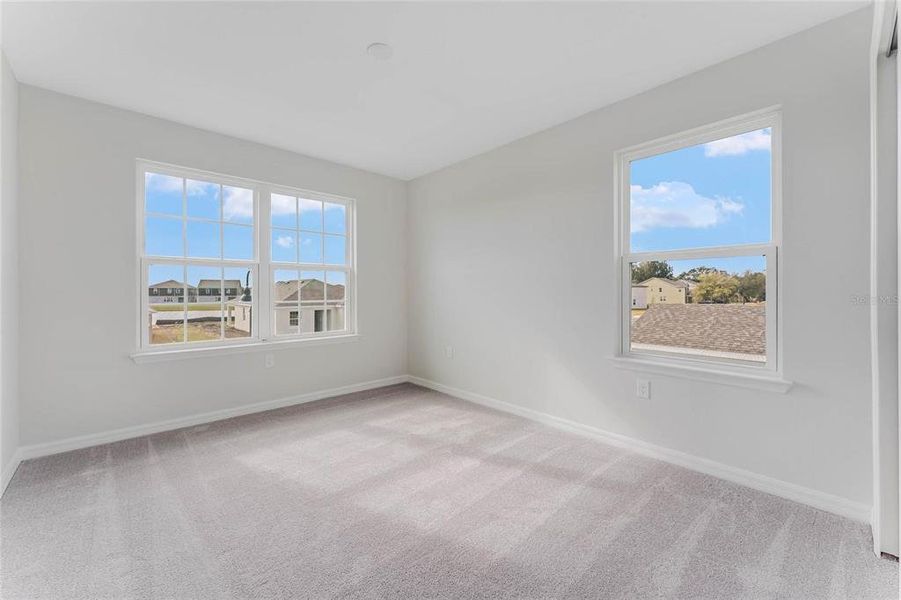 Spacious, unfurnished interior of a new home in Covered Bridge at Liberty Bluff, Haines City (Image 30).