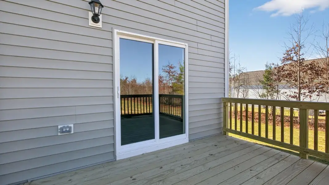 Exterior details and patio area of a home in Baker Farm, Youngsville (Image 3).
