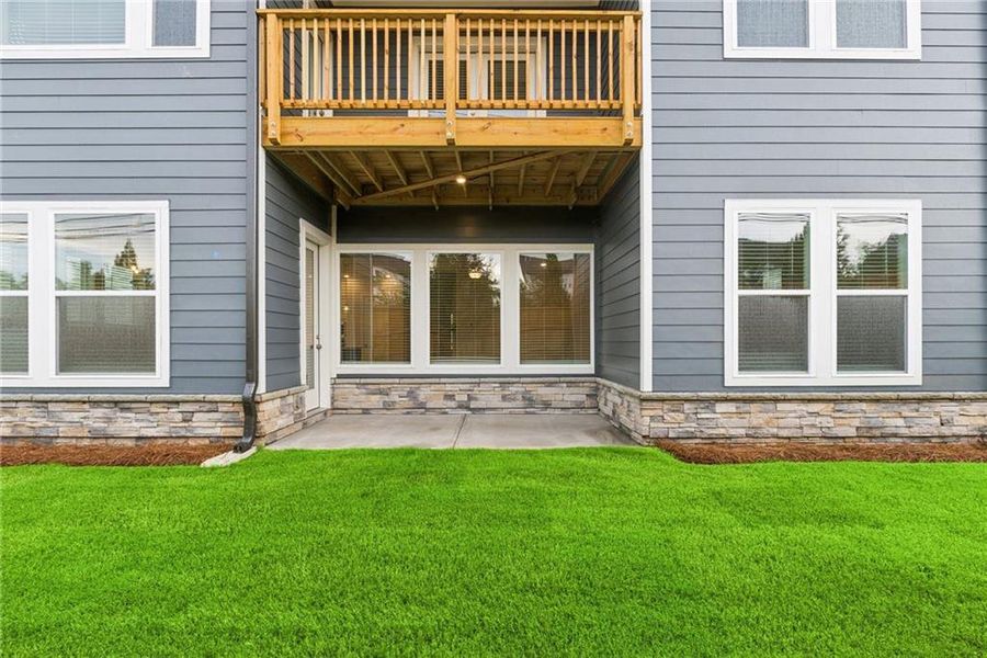 Exterior details and patio area of a home in Havencroft, Woodstock (Image 3).