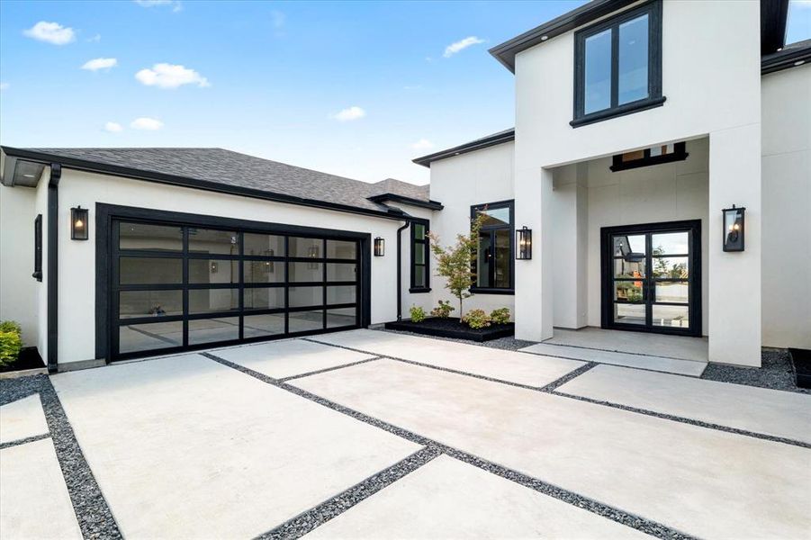 Garage featuring driveway