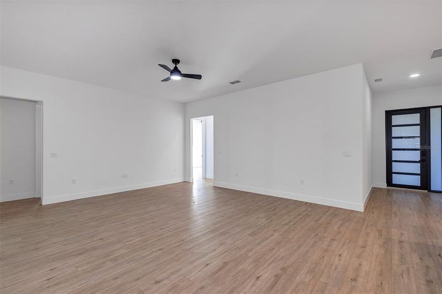 Spacious, unfurnished interior of a new home in , Port Charlotte (Image 40).