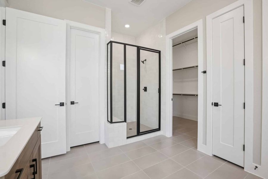 Furnished interior view inside a new home in 6 Creeks, Kyle (Image 32).