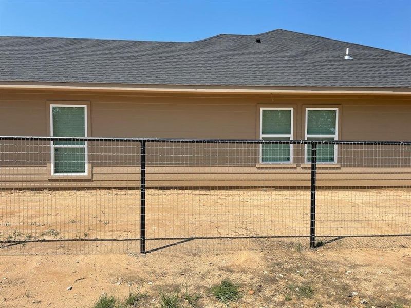 Front exterior of a new home in , Justin, TX, highlighting curb appeal (Image 16).