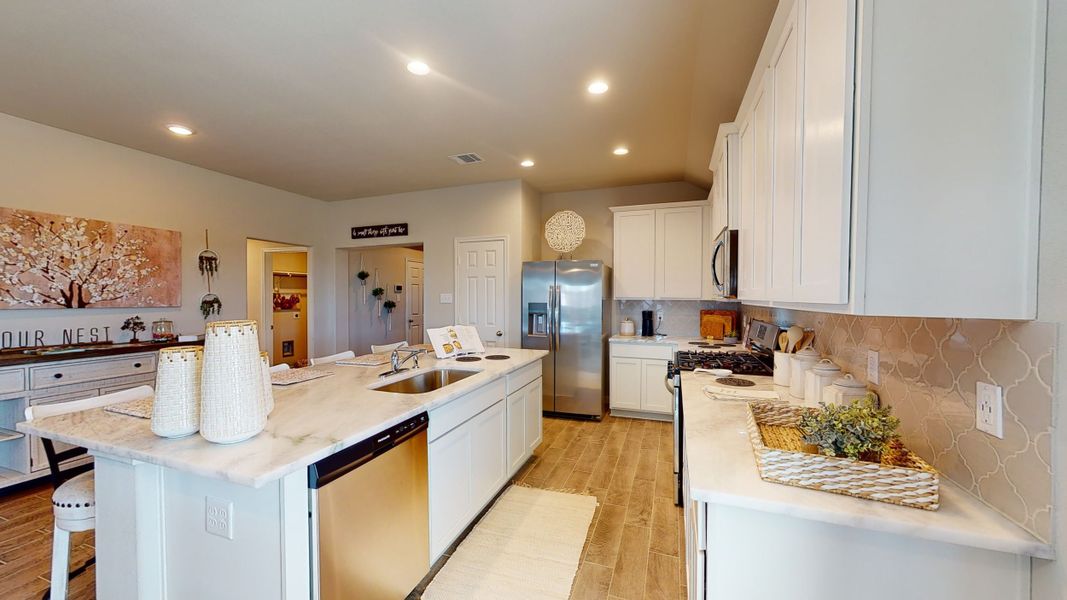 Representative furnished interior of a home built from the Floor Plan 2121 by Colina Homes in Grand Magnolia, Magnolia (Image 15). Representative furnished interior of a home built from the Floor Plan 2121 by Colina Homes in Grand Magnolia, Magnolia (Image 15).