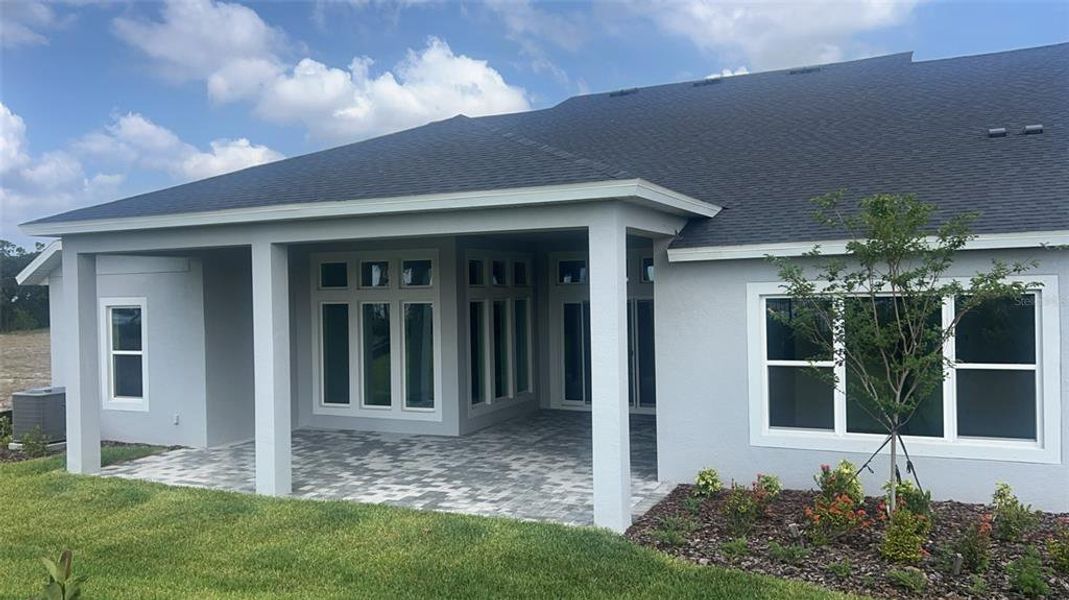 Exterior details and patio area of a home in Waterset, Apollo Beach (Image 14).
