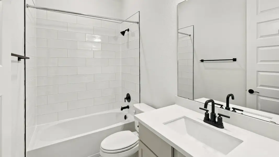 Furnished interior view inside a new home in Oaks at San Gabriel, Georgetown (Image 9).