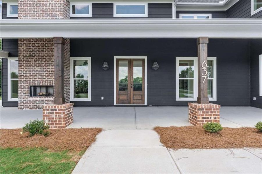 Exterior details and patio area of a home in , Roopville (Image 39).