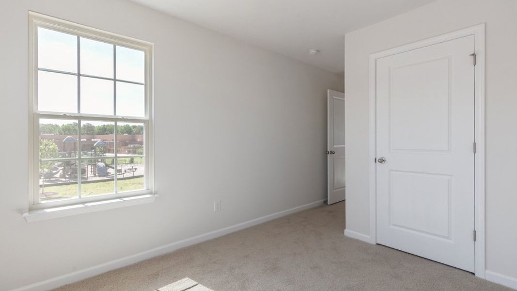 Spacious, unfurnished interior of a new home in The Townes at Matthews Landing, Fuquay Varina (Image 22). Spacious, unfurnished interior of a new home in The Townes at Matthews Landing, Fuquay Varina (Image 22).