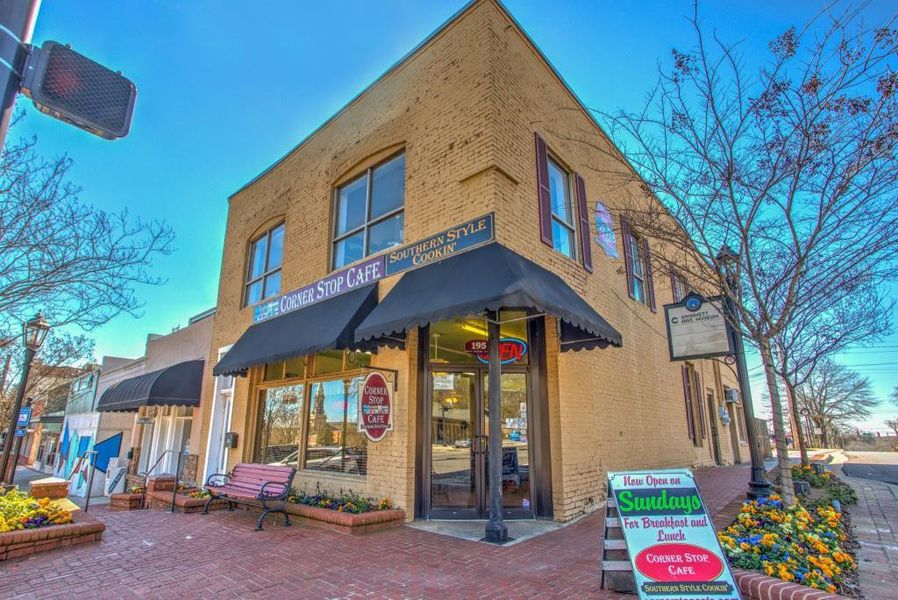 Front exterior of a new home in , Lawrenceville, GA, highlighting curb appeal (Image 34).
