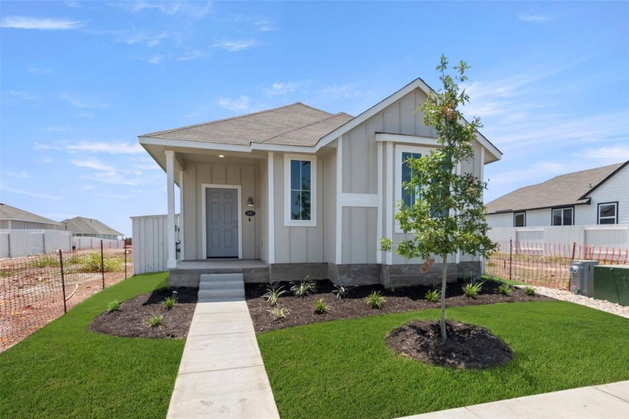 View of front of house featuring board and batten siding, a shingled roof, and covered porch View of front of house featuring board and batten siding, a shingled roof, and covered porch