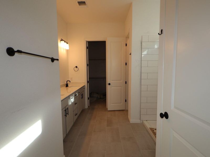 Furnished interior view inside a new home in Heritage, Dripping Springs (Image 7).