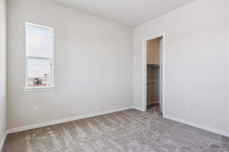 Spacious, unfurnished interior of a new home in Trails at Smoky Hill, Parker (Image 16).