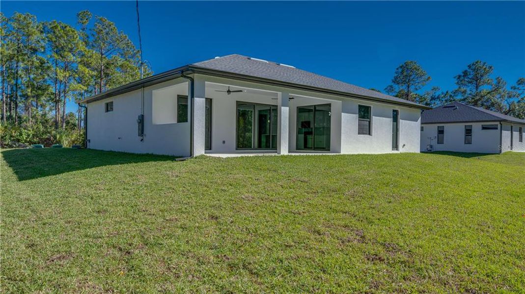 Exterior details and patio area of a home in , Lehigh Acres (Image 21). Exterior details and patio area of a home in , Lehigh Acres (Image 21).