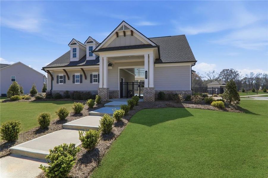 Front exterior of a new home in Rosewood Lake Estates, Hoschton, GA, highlighting curb appeal (Image 29). Front exterior of a new home in Rosewood Lake Estates, Hoschton, GA, highlighting curb appeal (Image 29).