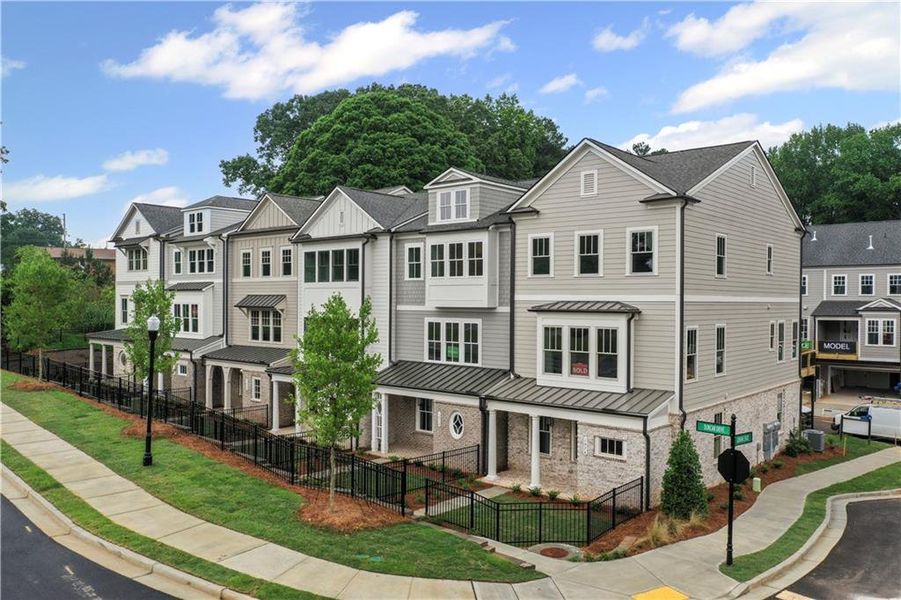 Front exterior of a new home in Devin's Shire, Kennesaw, GA, highlighting curb appeal (Image 21).