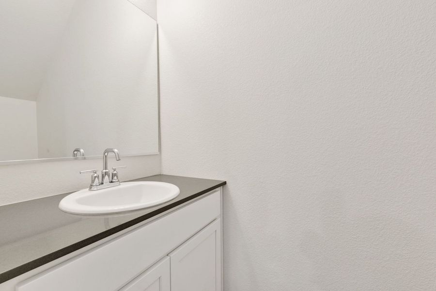 Representative furnished interior of a home built from the Pinecliffe by Baessler Homes in Liberty Draw, Evans (Image 12).
