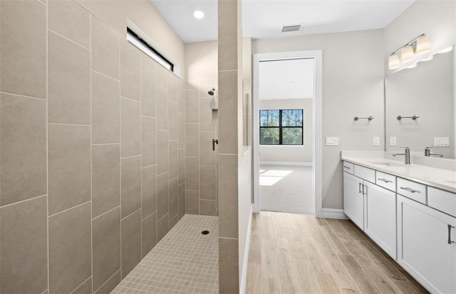 Furnished interior view inside a new home in Cedar Grove at The Woodlands, North Port (Image 10).